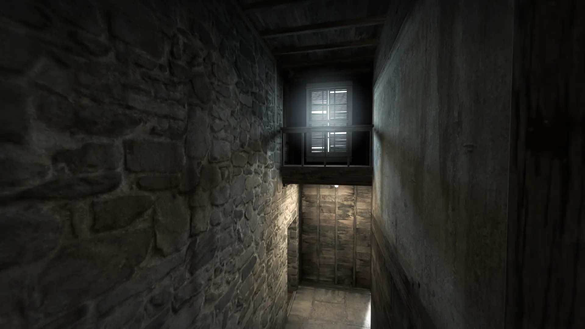 Dark stone stairwell with a shuttered window casting light on the stairs