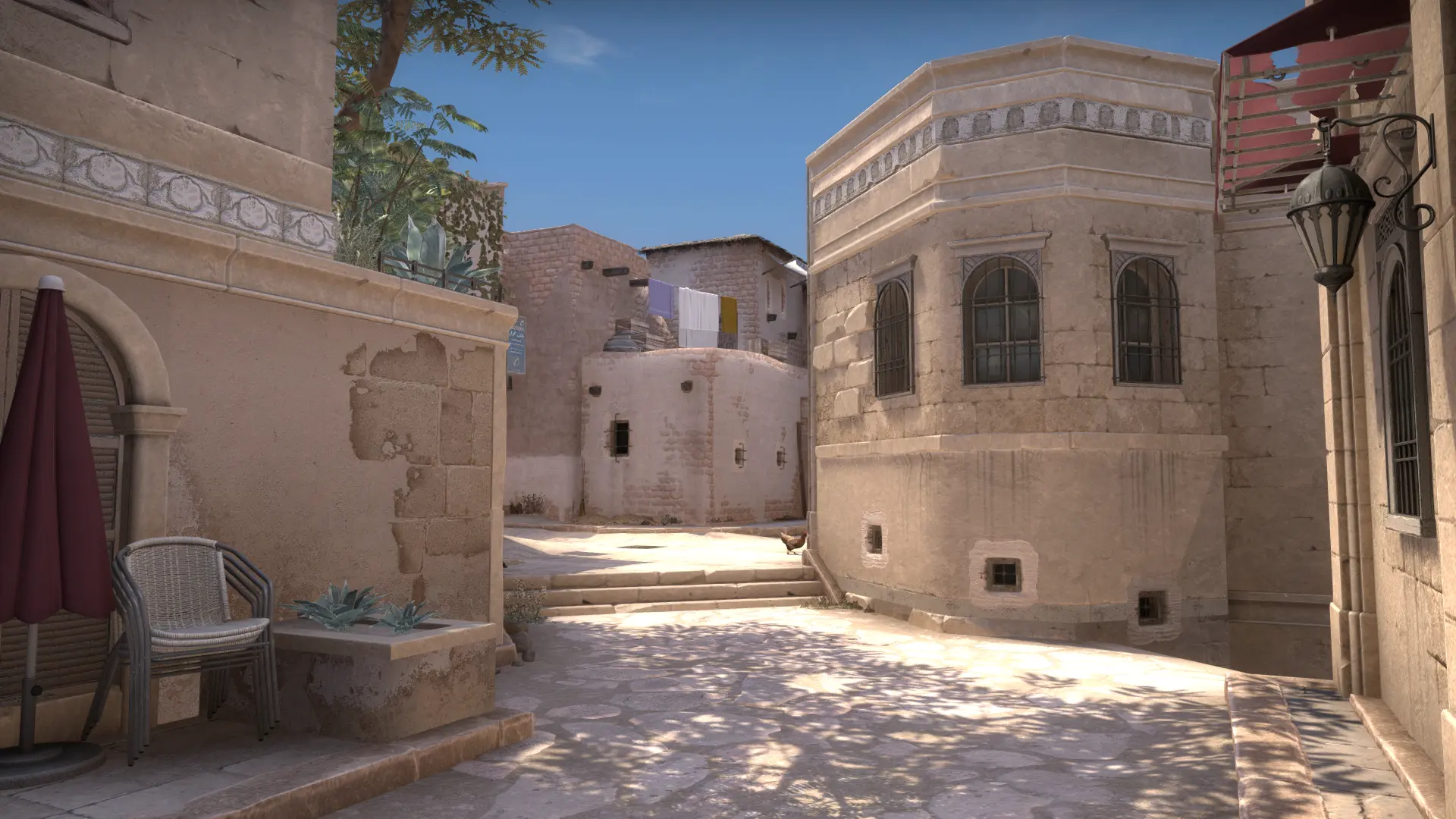 Sunlit stone passage through the village area of Anubis