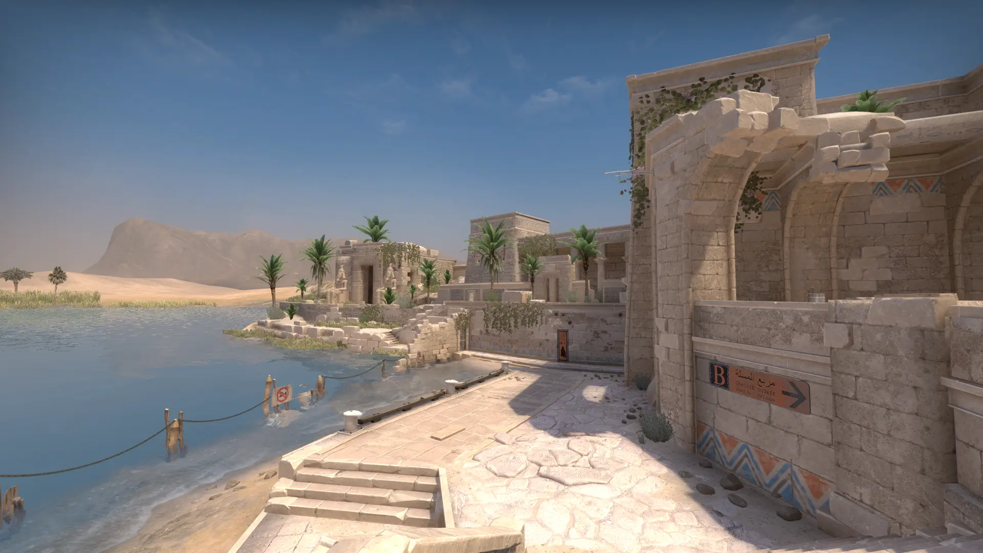 Waterside route through the Anubis map beside palms and ruins